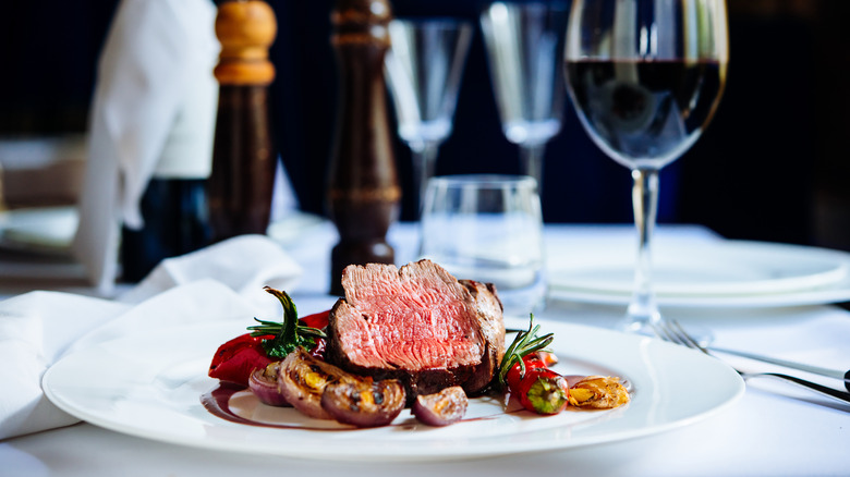 steak and vegetables plated at restaurant
