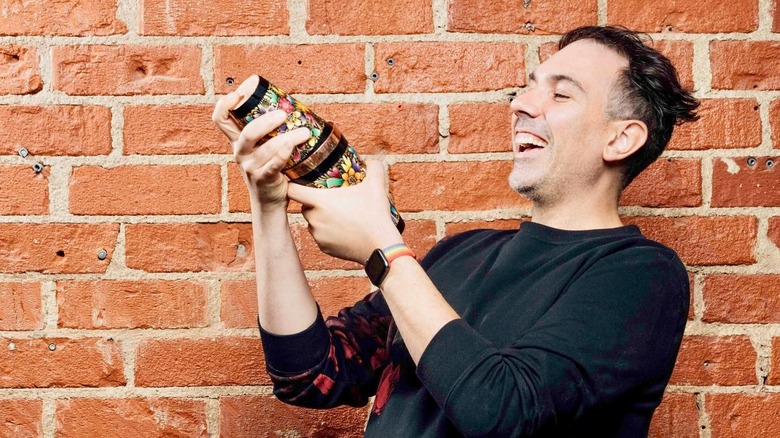 Dan Magro shaking a cocktail