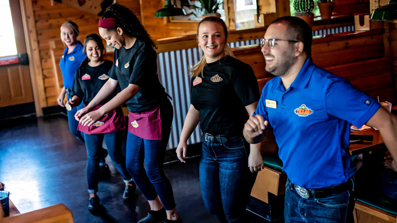 Texas Roadhouse workers participate in line dancing