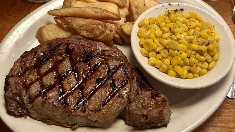 Steak, fries, and corn and Texas Roadhouse