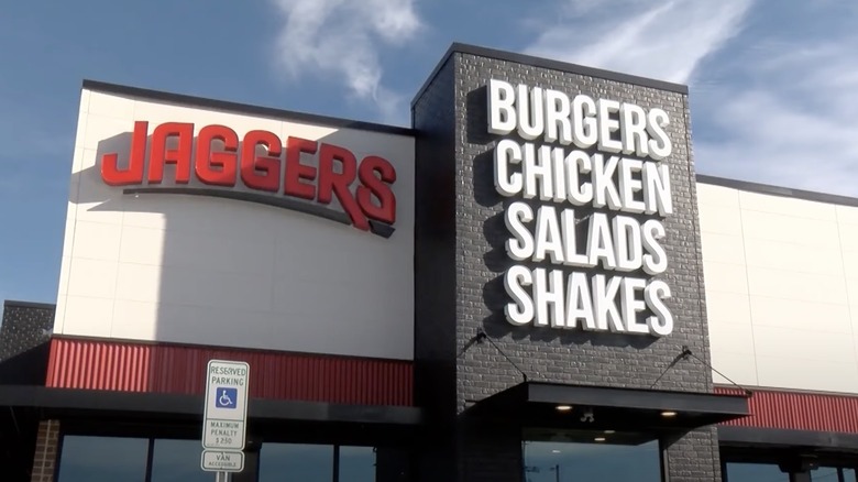 Exterior of a Jaggers restaurant promoting burgers, chicken, salads, and shakes