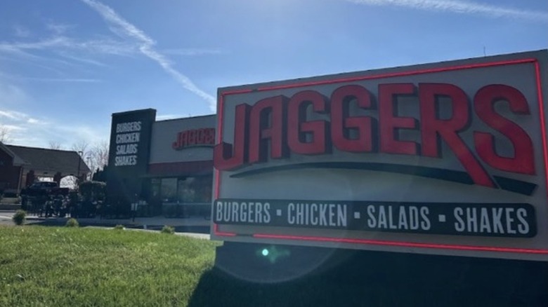 Jaggers sign in shadow with restaurant in background