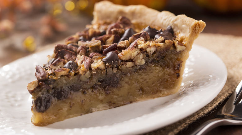 Slice of chocolate pecan pie