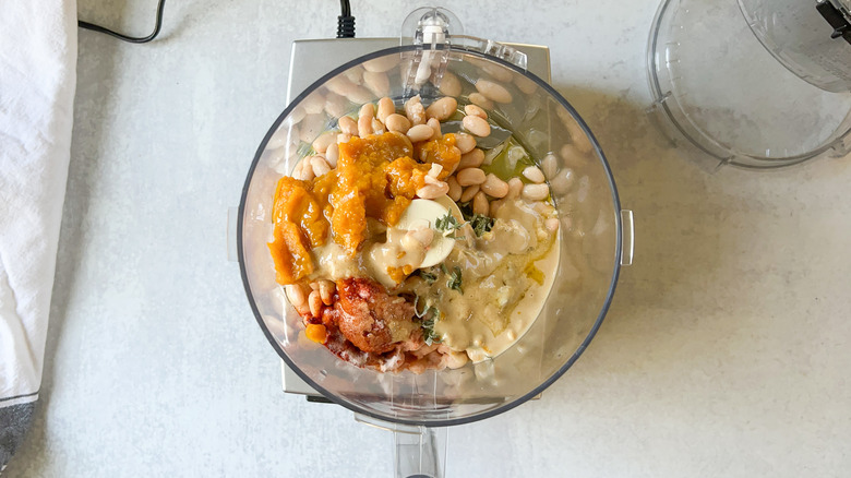 Pumpkin-sage hummus ingredients in food processor