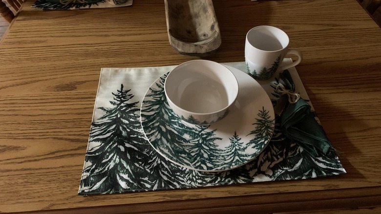 A set of Royal Norfolk dinnerware sits on a table
