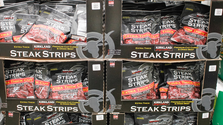 Display cases filled with Kirkland Signature Steak Strips