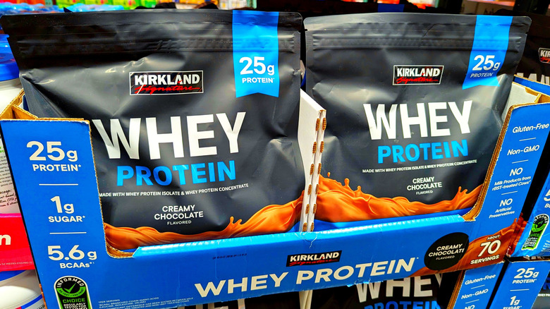 Bags of Kirkland Signature creamy chocolate whey protein