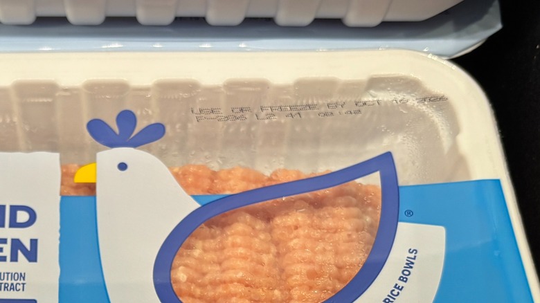 A use-by date on a package of ground chicken