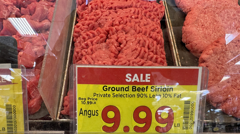 Ground meat in supermarket with sales sticker