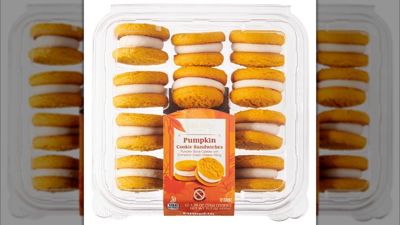Box of pumpkin cookie sandwiches pictured.