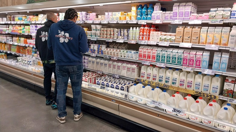 Trader Joe's employees in dairy section of store