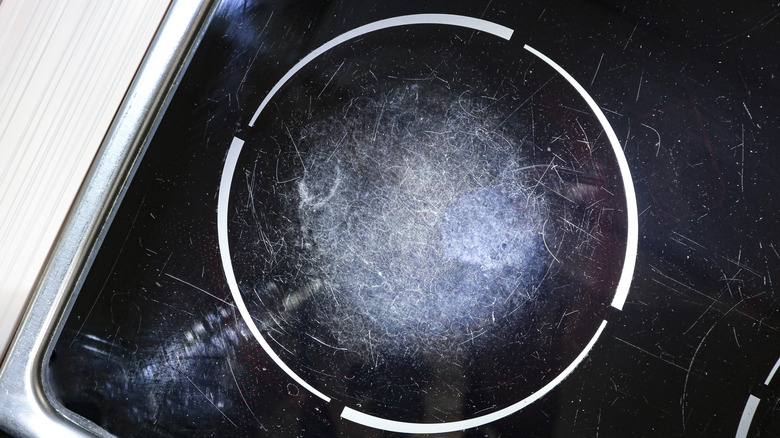 Badly scratched surface of an induction hob