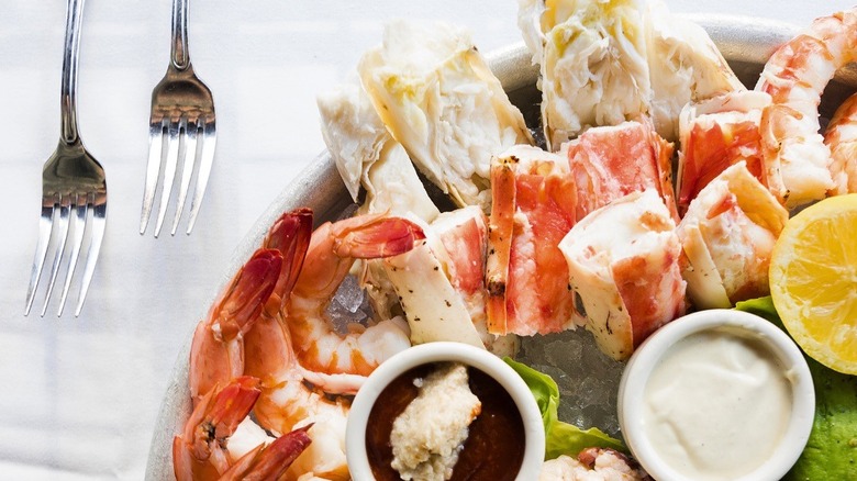 plate of seafood on white tablecloth
