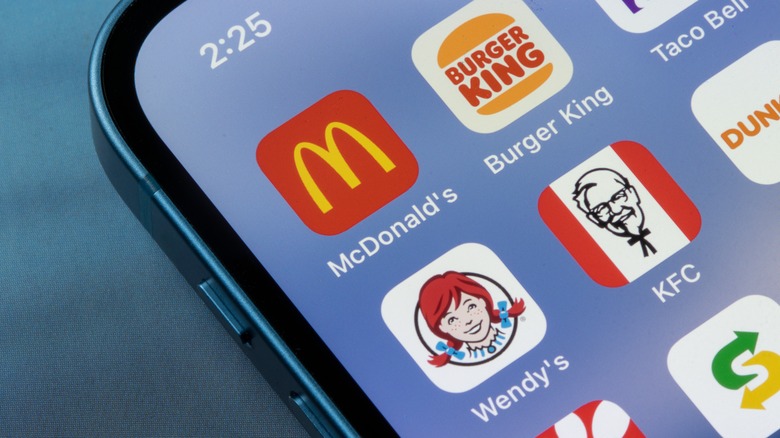 A phone screen with different fast food apps