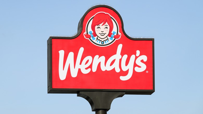 The Wendy's sign against a blue sky