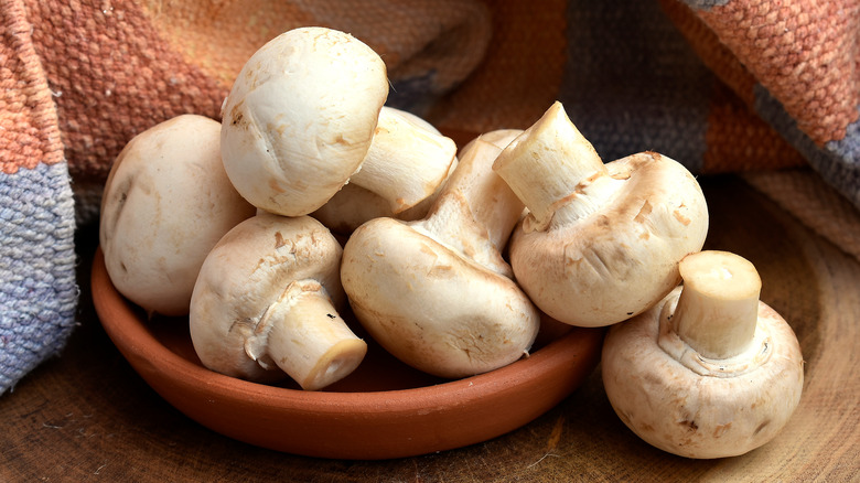 mushrooms in a brown bowl