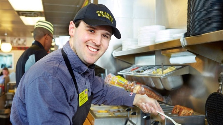 Waffle House cook at the grill