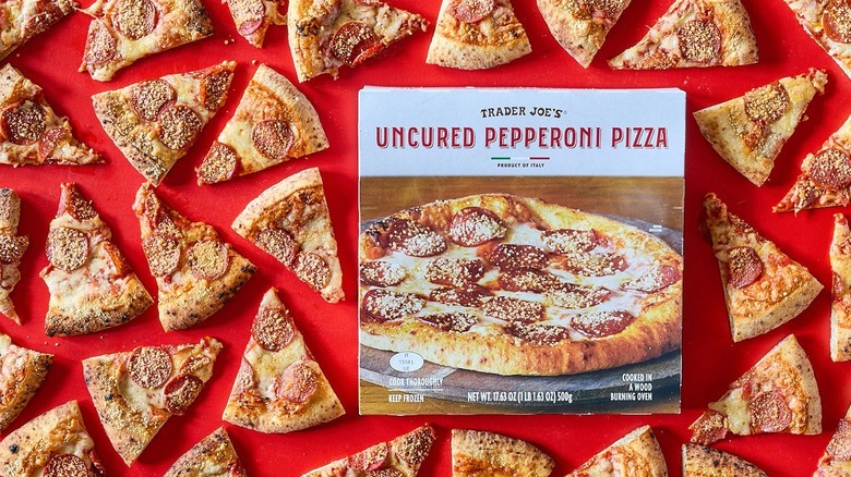 A package of Trader Joe's pizza next to a sea of slices of pizza.