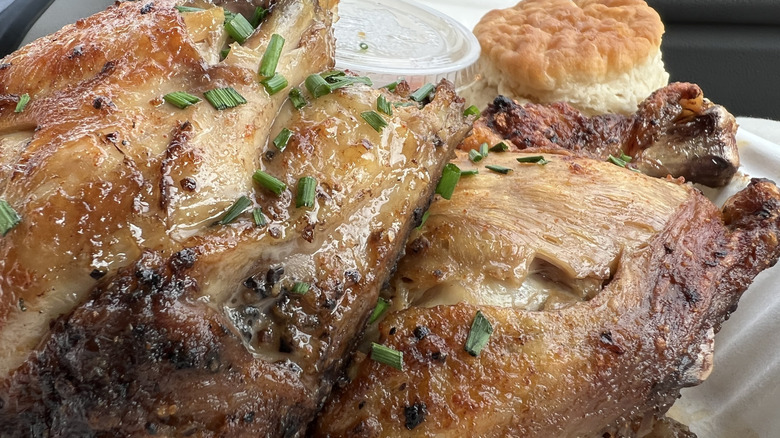 a rotisserie chicken with unusual coloring