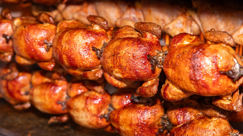 rotisserie chickens in the oven