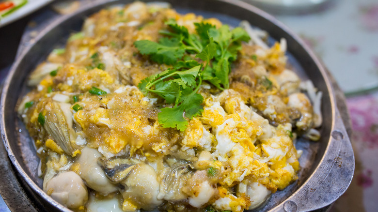Oyster omelet on an iron skillet