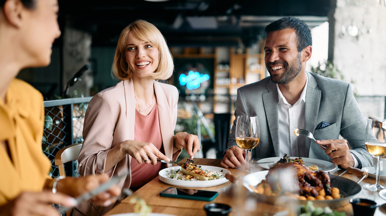 co-workers enjoying a business dinner