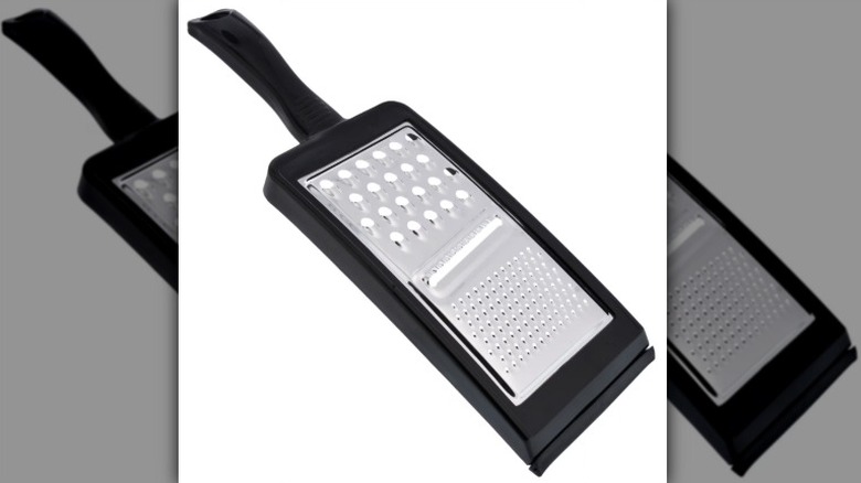 A Cooking Concepts 3-in-1 hand held grater is displayed against a white background