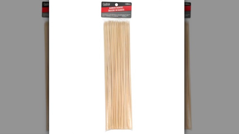 A pack of bamboo skewers is displayed against a white background