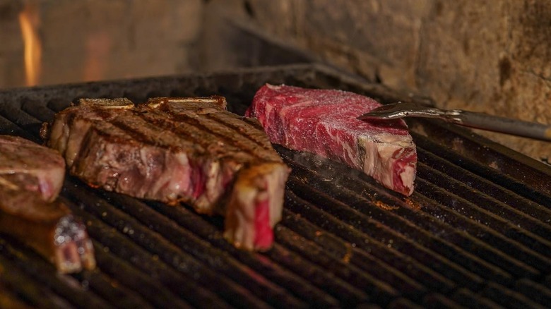 steaks on grill