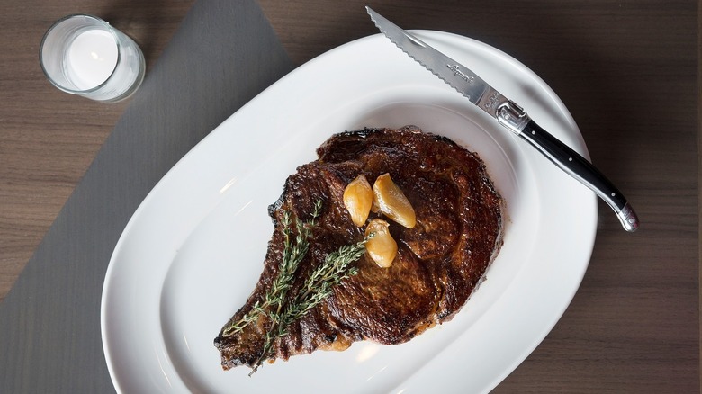 steak garlic rosemary knife candle