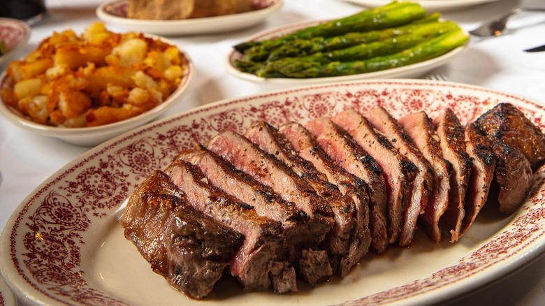 sliced steak asparagus potatoes