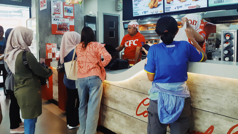 Customers order at KFC.