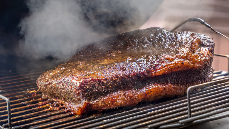 Brisket cooking on the grill