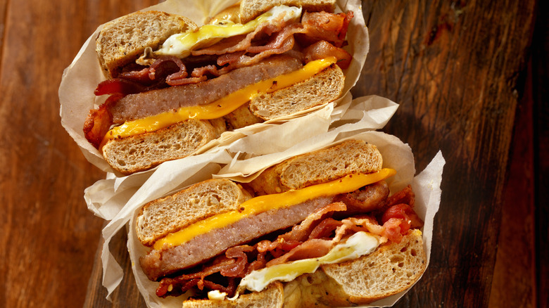 sausage, bacon, egg and cheese on a bagel