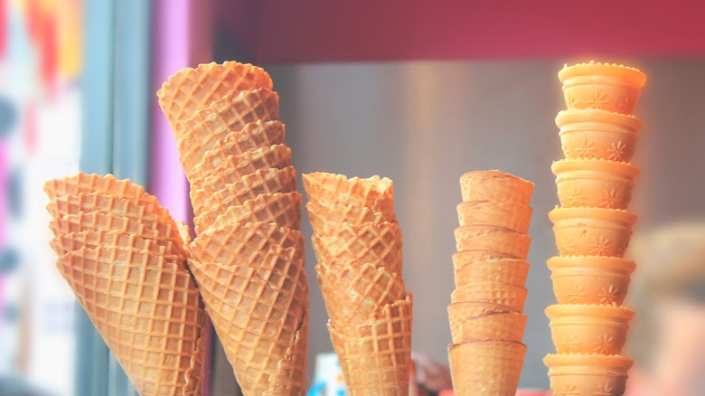 display of cake, sugar, and waffle cones