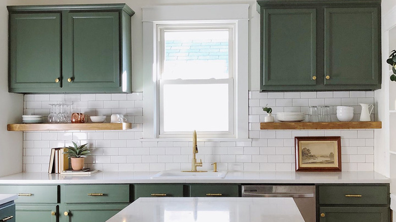 Kitchen cabinets painted green with Sherwin-Williams paint