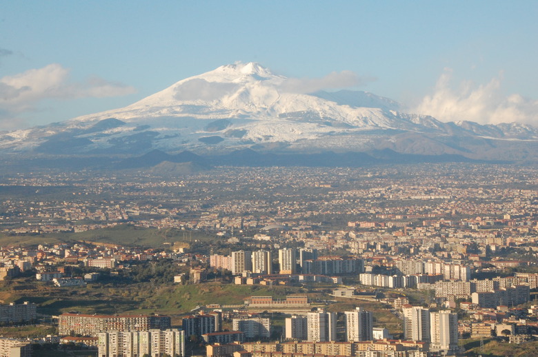 The volcanic soil surrounding Mount Etna produces excellent wines.