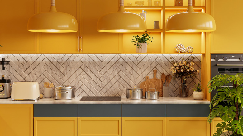 All-yellow kitchen walls and fixtures