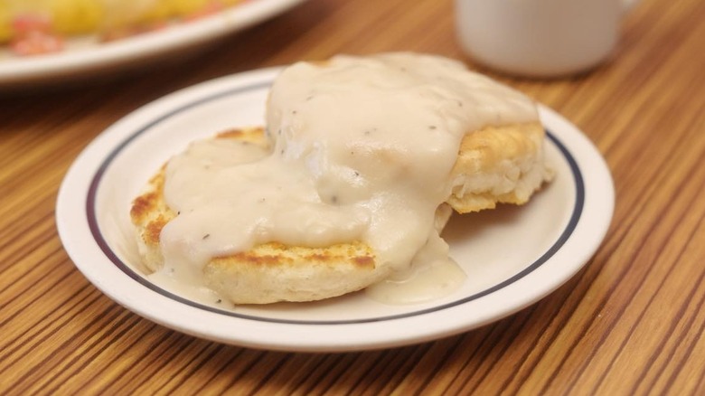 IHOP Buttermilk Biscuit and Gravy on a small plate.
