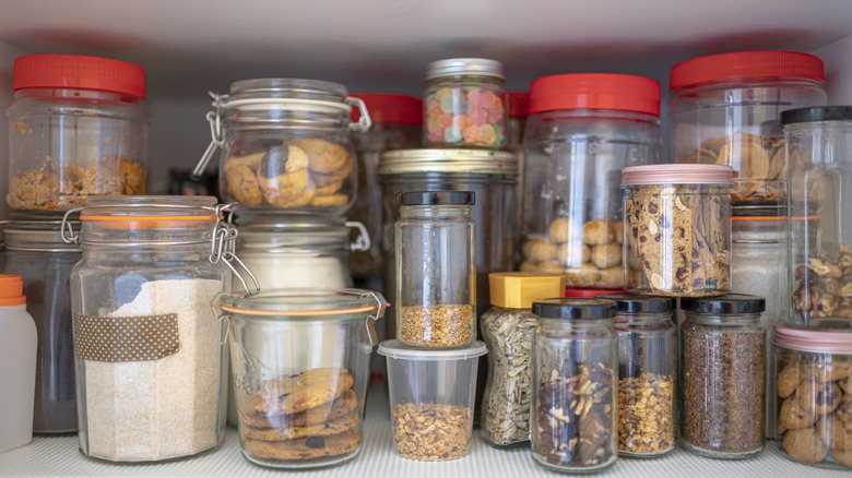 cabinet closet full of bottle of dried foods