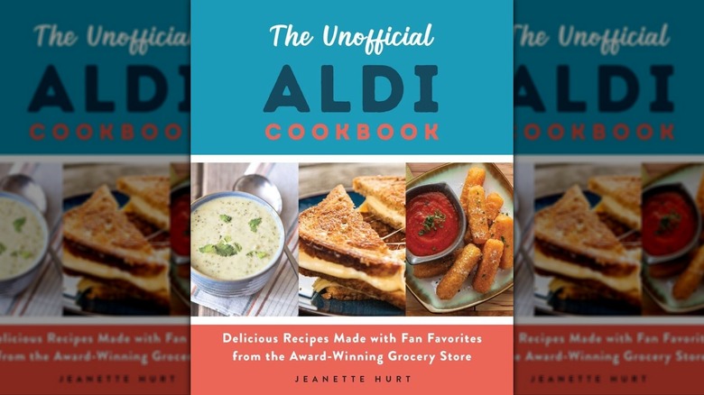"The Unofficial Aldi Cookboook" with pictures of soup, a grilled cheese, and mozzarella sticks on the cover