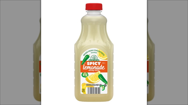 A bottle of lemonade sits against a white background.