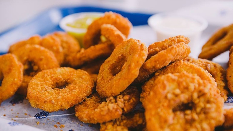 Order of White Castle onion rings sitting on a table