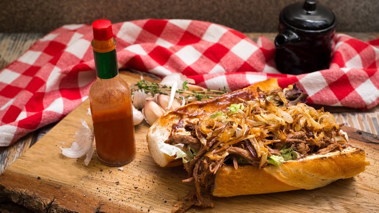 Roast beef po boy with hot sauce