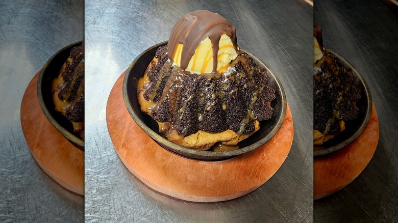 Chili's Chocolate Molten Cake on top of a Chocolate Chip Skillet Cookie.