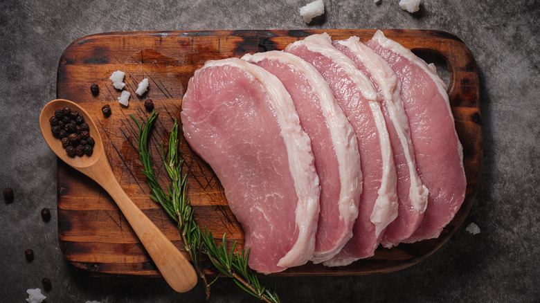 Slices of pork tenderloin on a cutting board