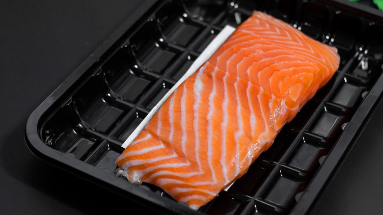 Fish fillet packaged with pad