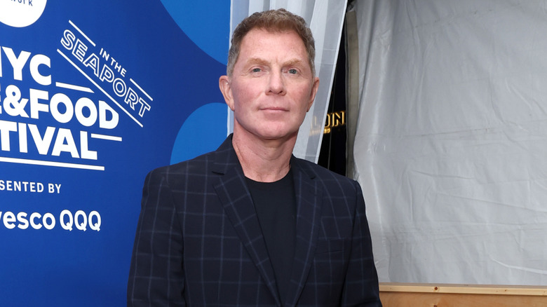 Bobby Flay poses at Food Network New York City Wine & Food Festival