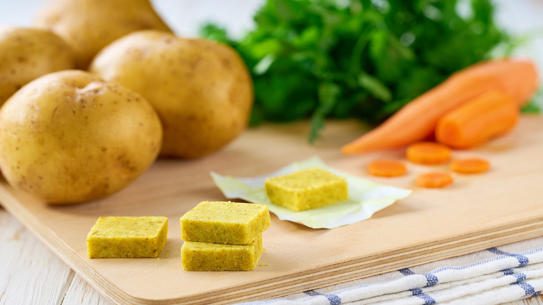 Bouillon cubes pictured on cutting board