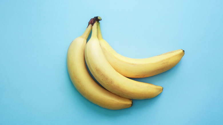 Yellow bananas on a blue background